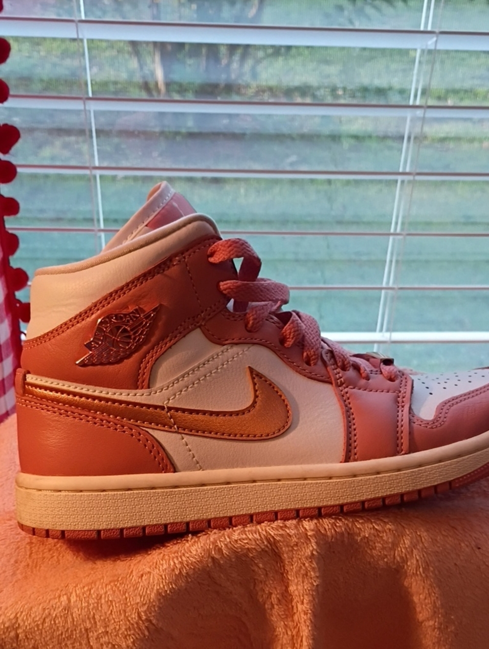 Nike Women’s Mid-Top Sneakers in White and Coral Pink